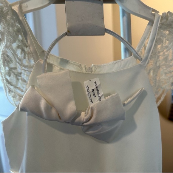 Biscotti Flower Girl White Dress with Lace Shoulders & Matching Bow Headband - Picture 12 of 14